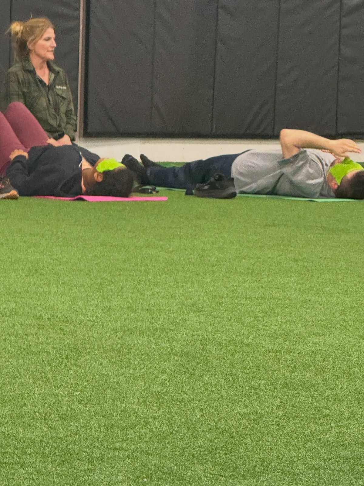 Adaptive yoga participants resting after movement at REPS